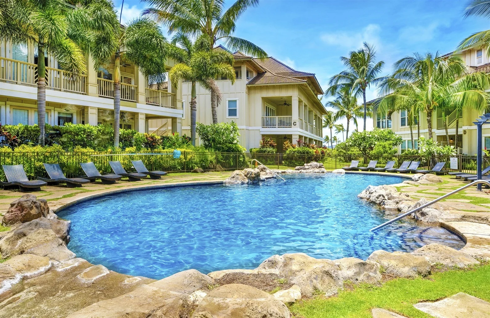 Enjoy a cocktail next to the resort style pool